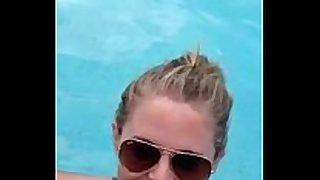 Blowjob in public pool by golden-haired, recorded on m...