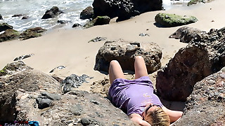 Voluptuous blonde sunbathing nude on the beach fucks passer-by