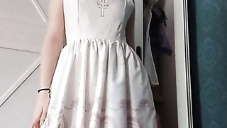 Gentle homemade masturbation in a white dress and a passionate stormy orgasm
