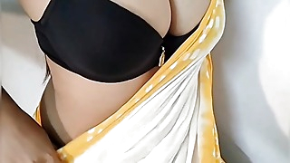 Desi bengali shruti bhabhi teasing with her big natural tits in yellow saree