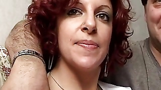 Busty Italian redhead girl shows her skills having sex