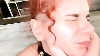 The redhead gets fucked hard in the mouth for his debts