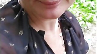 I caress myself in the woods and get surprised by a stranger I decide to suck him thoroughly like a good milf