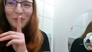 Cute Redhead Teen masturbates on public toilet