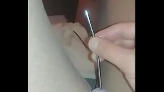 Caged sissy in nylons sounding her clitty