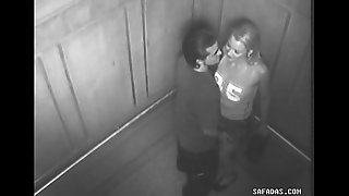 Couple fellow-feeling a amour in elevator forgot involving is a camera